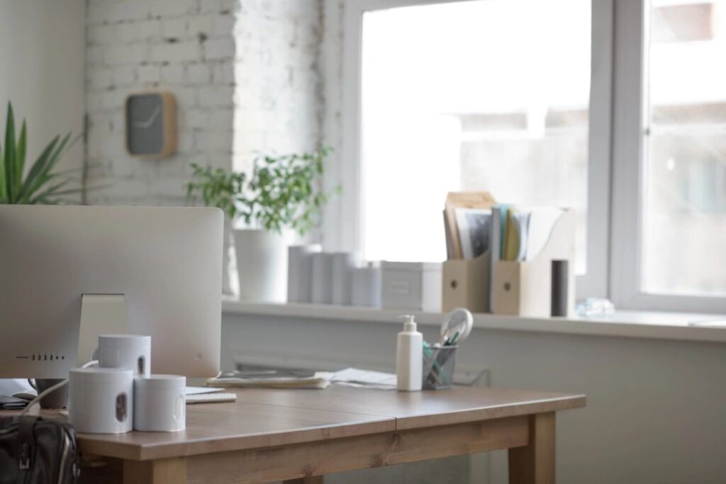 A picture of an office desk with a computer monitor