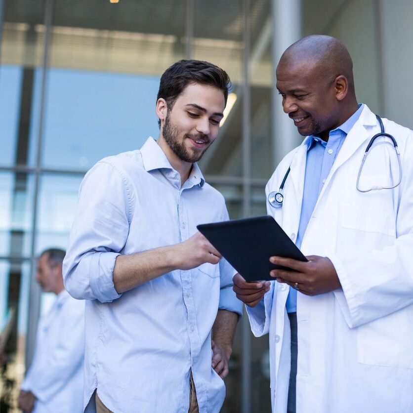 A doctor talking with a man